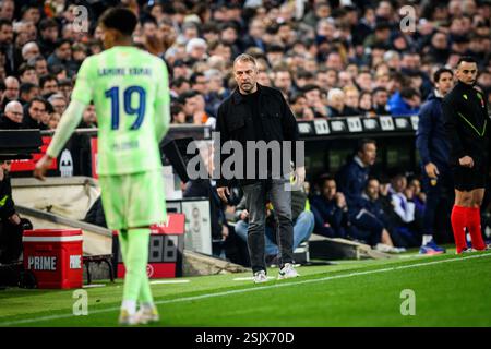 FC Barcelona’s coach Hansi Flick (r) and Real Sociedad’s Imanol ...