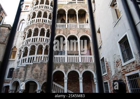 The Palazzo Contarini del Bovolo (also called the Palazzo Contarini Minelli dal Bovolo) is a small palace in Venice, best known for its external multi-arch spiral staircase known as the Scala Contarini del Bovolo (literally, 'of the snail'). Venice, city, major seaport, and capital of both the provincia (province) of Venezia and the regione (region) of Veneto, northern Italy. An island city, it was once the centre of a maritime republic. It was the greatest seaport in late medieval Europe and the continent's commercial and cultural link to Asia. In 1987 Venice and its lagoon were collectively Stock Photo