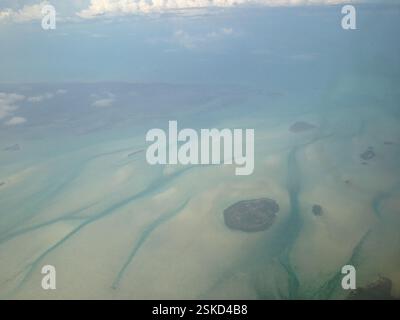 Aerial view of the dark blue ocean with textured water patterns and ...