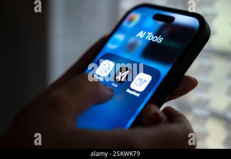 February 12, 2025: New Delhi, India. 12 February 2025 : In this photo illustration Grok, an AI chatbot by xAI, ChatGPT, Deepseek app icons seen in an iPhone screen. Generative AI and modern chatbot tech concept. (Credit Image: © David Talukdar/ZUMA Press Wire) EDITORIAL USAGE ONLY! Not for Commercial USAGE! Stock Photo