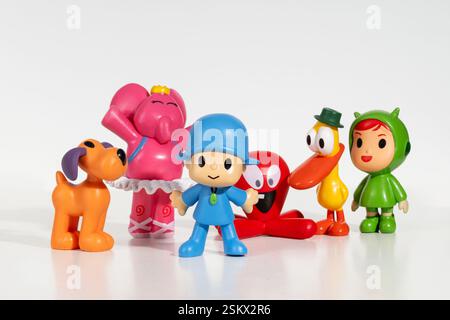 Group of colorful Pocoyo and friends figurines standing on white background Stock Photo