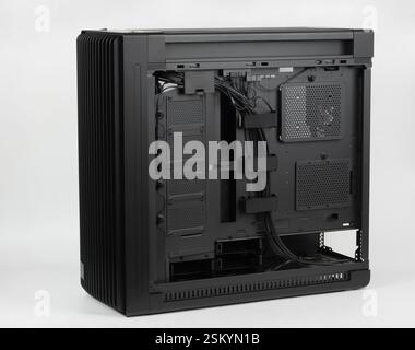 Side view of  PC case, chassis without  right  metal panel.  Chassis supports up to four HDDs or up to eight SATA SSDs. Stock Photo