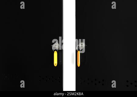 Modern lockers with bright keys, closeup view Stock Photo