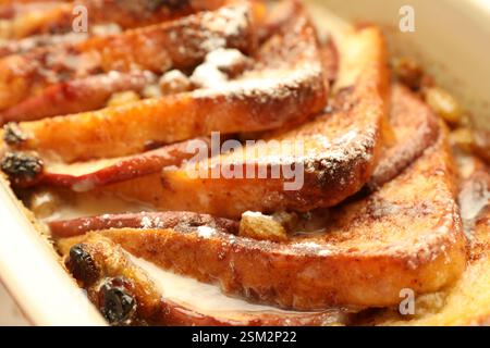 Freshly baked bread pudding in baking dish, closeup Stock Photo