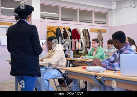 Teacher giving lesson to high school students institute Stock Photo