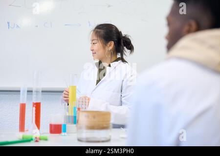 Chemistry students doing experiment in university laboratory Stock Photo