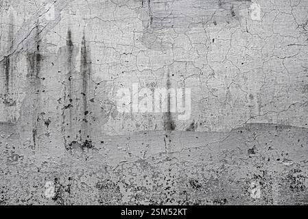 The cement wall is old with cracks and scratches Stock Photo