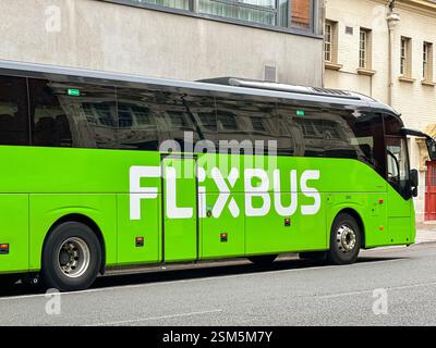 Cardiff, Wales - 24 July 2024: Express coach operated by Flixbus parked on a street in Cardiff city centre Stock Photo