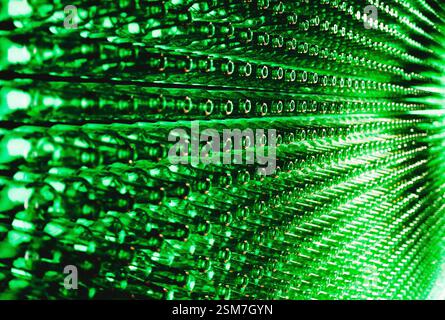 a wall made of empty heineken bottles Stock Photo