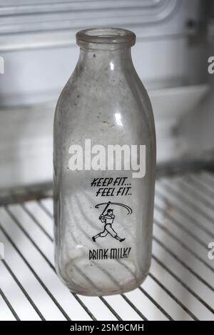 Milk bottle found in an abandoned home Stock Photo