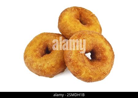 Three golden donuts isolated on white background Stock Photo
