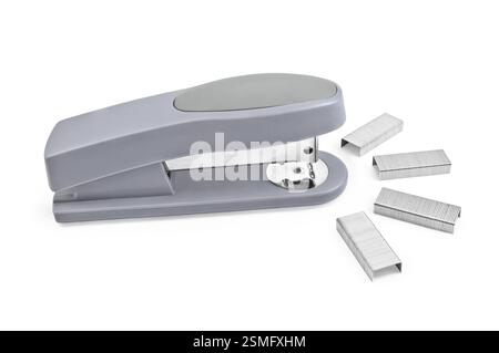 Gray stapler staples with four blocks isolated on white background Stock Photo