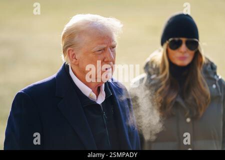 Marine One, with President Donald Trump aboard, passes the tail of Air ...