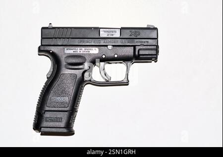 Houston, Texas USA 02-03-2025: Springfield XD 40 compact semi automatic handgun isolated white. Stock Photo