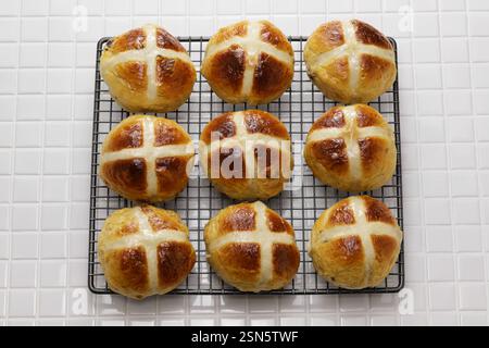 Homemade hot cross buns, a bread commonly eaten in Britain during Easter. Stock Photo