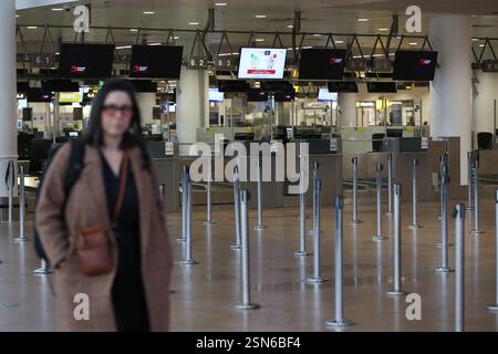 (250213) -- BRUSSELS, Feb. 13, 2025 (Xinhua) -- Empty waiting lines are seen at the departure hall of Brussels Airport in Zaventem, Belgium, Feb. 13, 2025. Tens of thousands of people marched through central Brussels, Belgium, on Thursday to protest against planned government reforms, as unions warned of further strike action unless policymakers reconsider their proposals.   The demonstration brought parts of the capital to a standstill, halting traffic on key routes and disrupting public transport. Brussels Airport canceled 430 flights as ground operations were suspended, while metro, bus, an Stock Photo