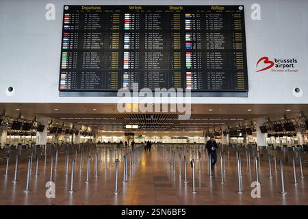 (250213) -- BRUSSELS, Feb. 13, 2025 (Xinhua) -- The empty departure hall of Brussels Airport is seen in Zaventem, Belgium, Feb. 13, 2025. Tens of thousands of people marched through central Brussels, Belgium, on Thursday to protest against planned government reforms, as unions warned of further strike action unless policymakers reconsider their proposals.   The demonstration brought parts of the capital to a standstill, halting traffic on key routes and disrupting public transport. Brussels Airport canceled 430 flights as ground operations were suspended, while metro, bus, and tram services we Stock Photo
