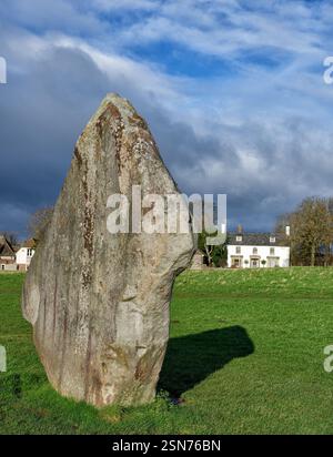 Sarsen standing stones of the outer ring of Avebury neolithic henge and stone circle in Wiltshire UK Stock Photo