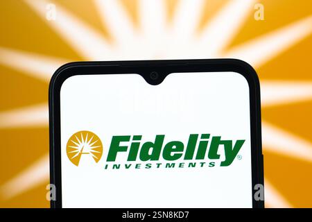 In this photo illustration, the Fidelity Investments logo is seen displayed on a smartphone screen. Stock Photo