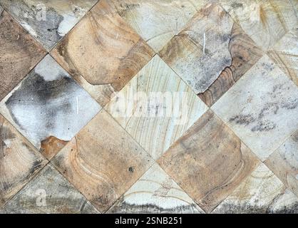 Natural stone marble tiles wall texture in mix of blue, grey, cyan color with random abstract veins. Diamond shape and arrangement marbled outdoor Stock Photo