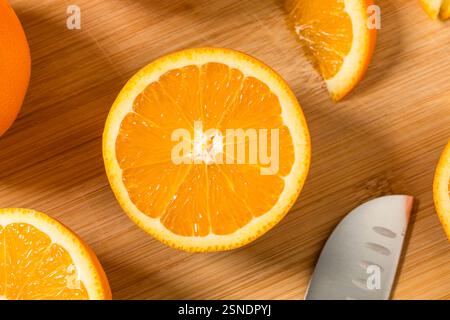 Raw Organic Sweet Oranges Cut in Half Ready to Eat Stock Photo