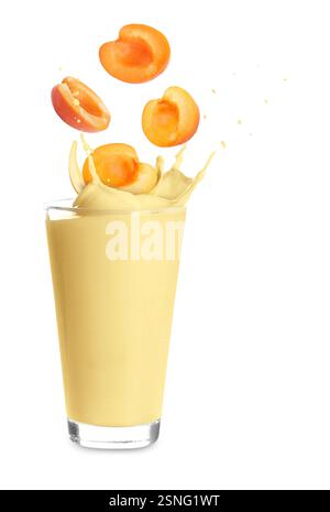 Apricot milkshake and fresh fruits on white background Stock Photo