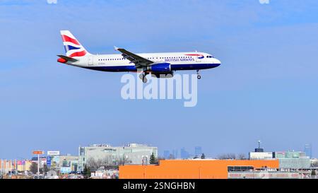 Warsaw ,Poland. 9 February 2025. Plane G-EUUL - Airbus A320-232 - British Airways just before landing at the Chopin airport. Stock Photo