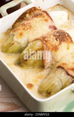 Chicory baked with bacon and cheese, lodz, poland Stock Photo