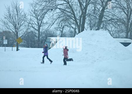 Montreal, Canada. 13th Feb, 2025. Children enjoy the snow during the major winter depression brought snowstorms that dumped up to 40 centimeters of snow in Montreal. Schools were closed and flights were cancelled due to the adverse weather conditions. on February 13, 2025 in Montreal, Canada. (Photo by Horacio Zamora Rios/ Eyepix Group/Sipa USA) Credit: Sipa USA/Alamy Live News Stock Photo