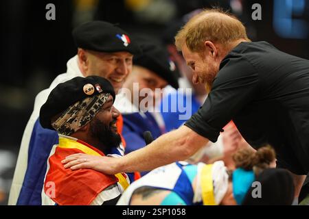 The Duke of Sussex presents gold medals to team France at the end of