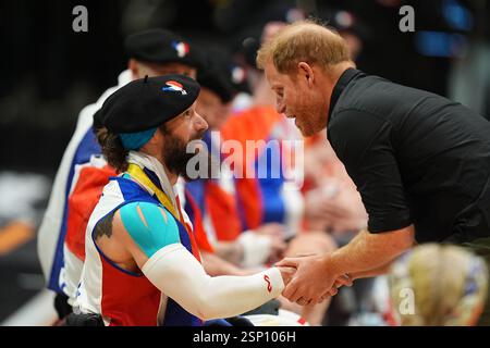 The Duke of Sussex presents gold medals to team France at the end of
