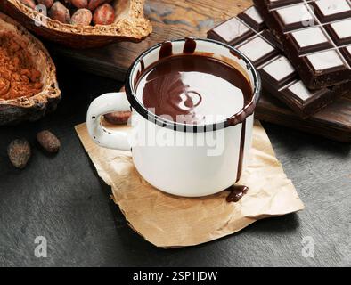 Melted chocolate drink on dark background. Stock Photo