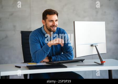 Happy professional business man company employee, young entrepreneur, smiling businessman working Stock Photo
