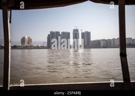 Boat heading to the Golden Triangle Special Economic Zone in Laos ...