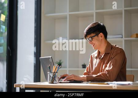 Businessman or student studying online, analyzing financial reports Stock Photo