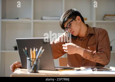 Businessman or student studying online, analyzing financial reports Stock Photo