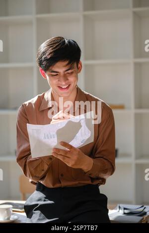 Businessman analyzing financial data and market trends Stock Photo