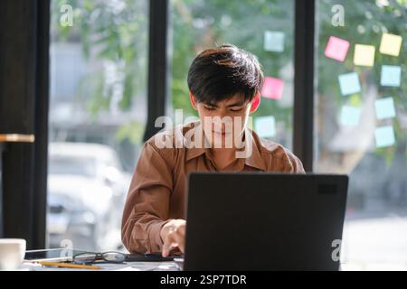 Businessman or student studying online, analyzing financial reports Stock Photo