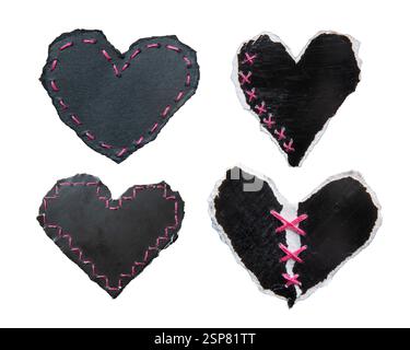 Black heart-shaped torn papers with pink stitches on white background with clipping path Stock Photo