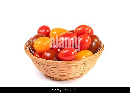 Various mini tomatoes against a white background Stock Photo