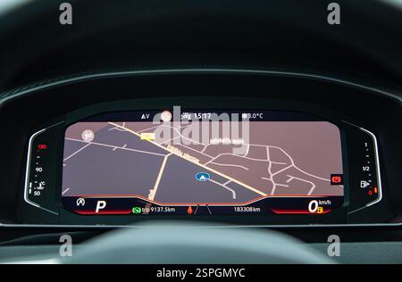 screen with navigation on the car control panel, speedometer, fuel level and engine temperature level Stock Photo