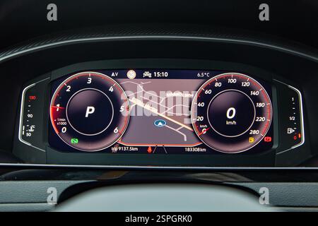 Dashboard screen with navigation on the car control panel, speedometer, fuel level and engine temperature level Stock Photo