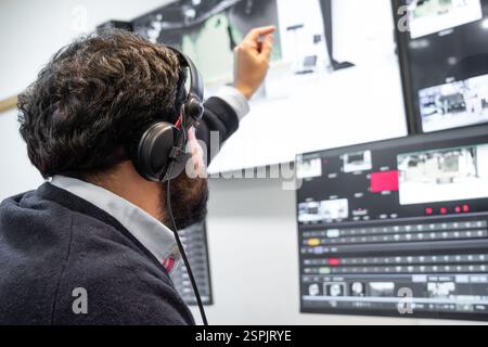 Security guard watching video monitoring surveillance security system. High quality photo Stock Photo