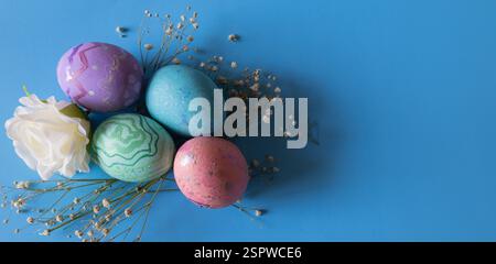 Pastel coloured Easter eggs .Homemade painted eggs. Christian decoration. Horizontal real picture. Colorful Easter eggs on the traditional religious d Stock Photo