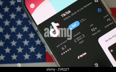 Apple App Store and Google Play Store icons are seen respectively on an ...