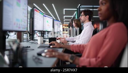 Diverse Business Team Organizing Schedule on Kanban Task Board Stock Photo
