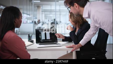 Professional African-American Programmer Leading Diverse Web Development Team in Office Stock Photo