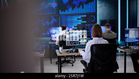 Analyzing KPI Dashboard graphs on a black tablet in office. Financial advisor monitoring data Stock Photo