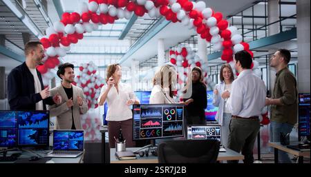 Successful business team celebrates job success with a dance party. Stock Photo
