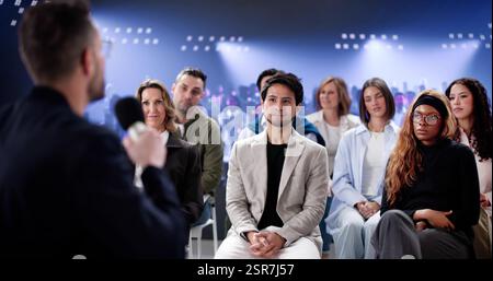 Successful Financial Analyst Leading Seminar on Corporate Sales Strategies. Stock Photo